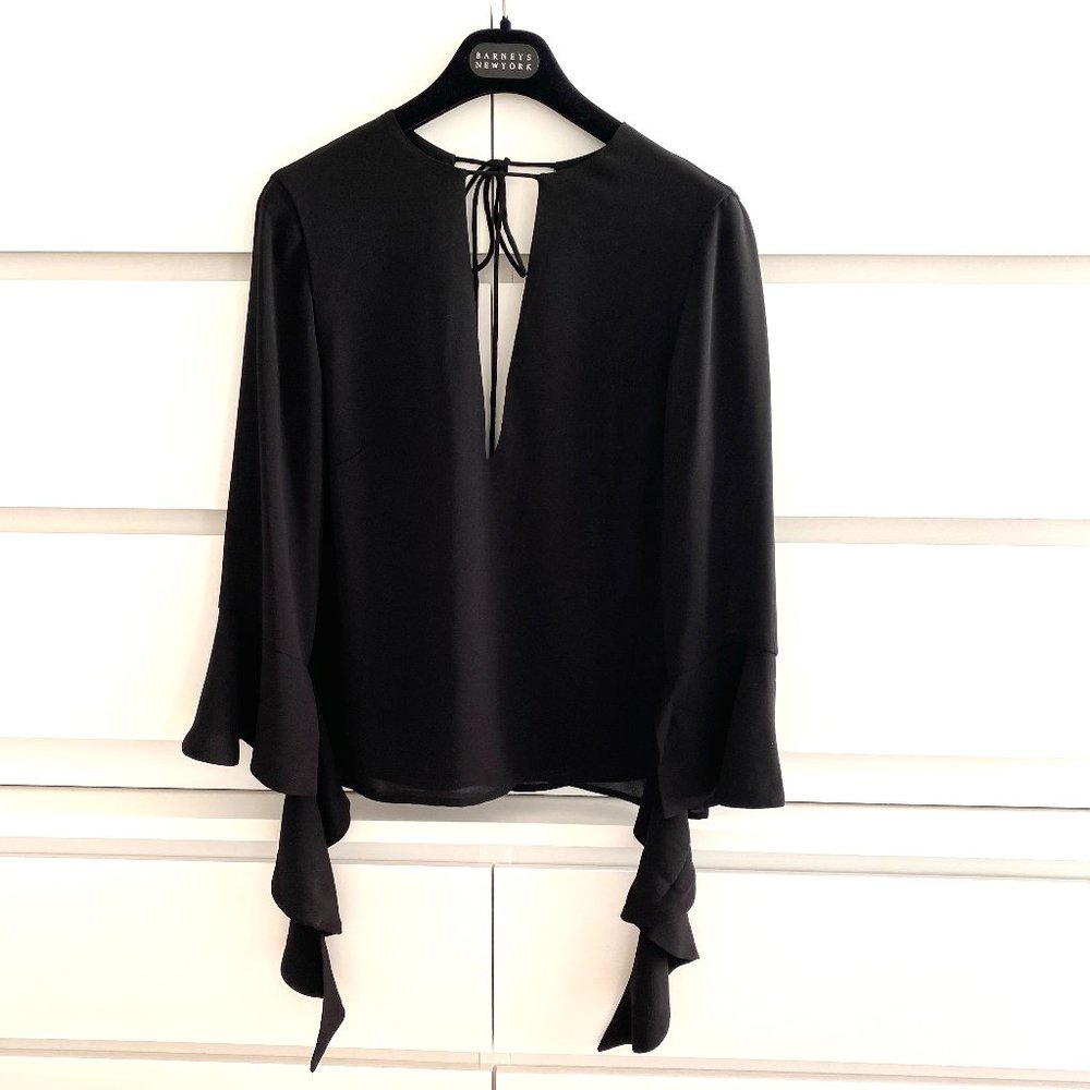 Rare C/MEO Collective black V-neck top with unique flare sleeve